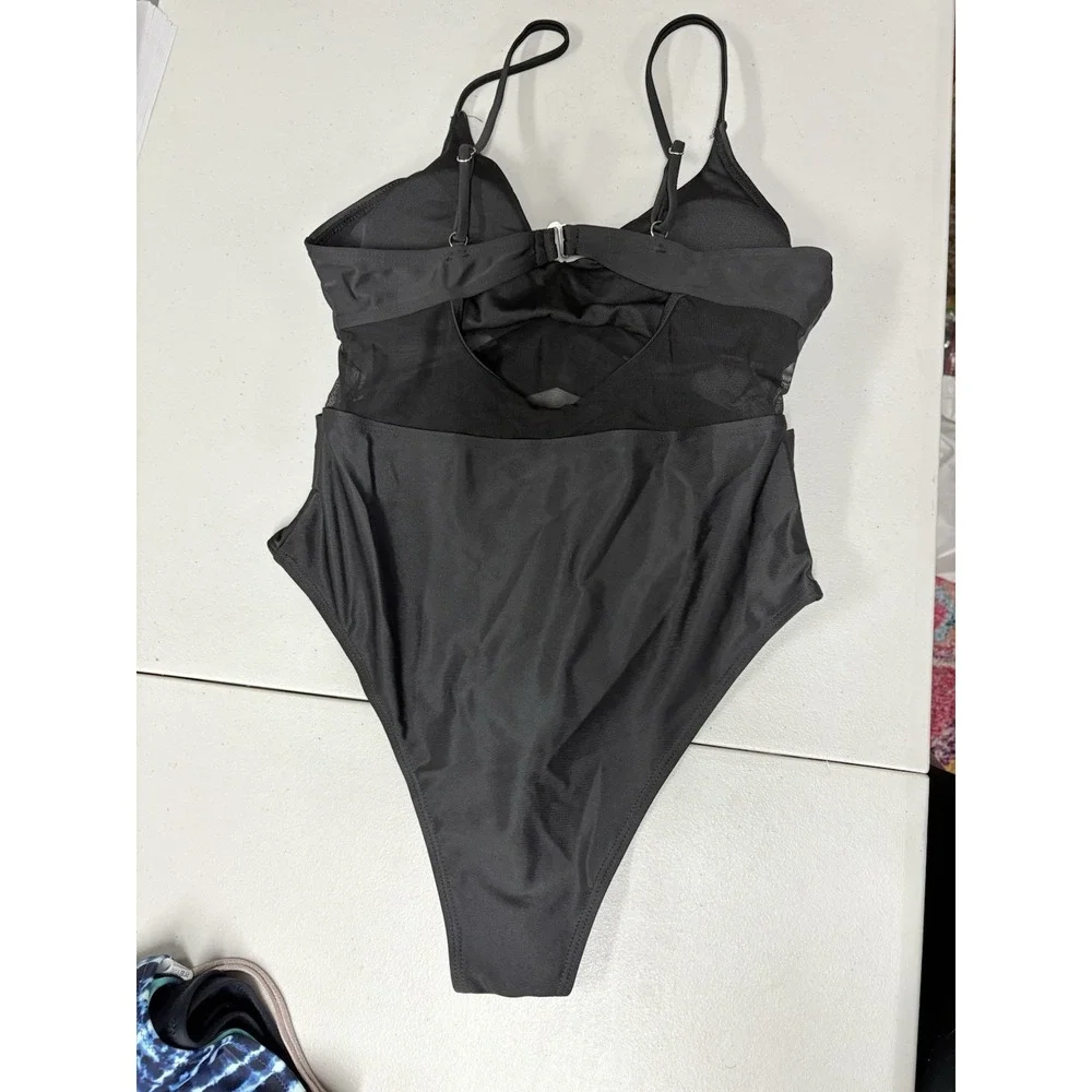 NWOT Womens One Piece Black Swimsuit. sheer Detailing‎ Medium